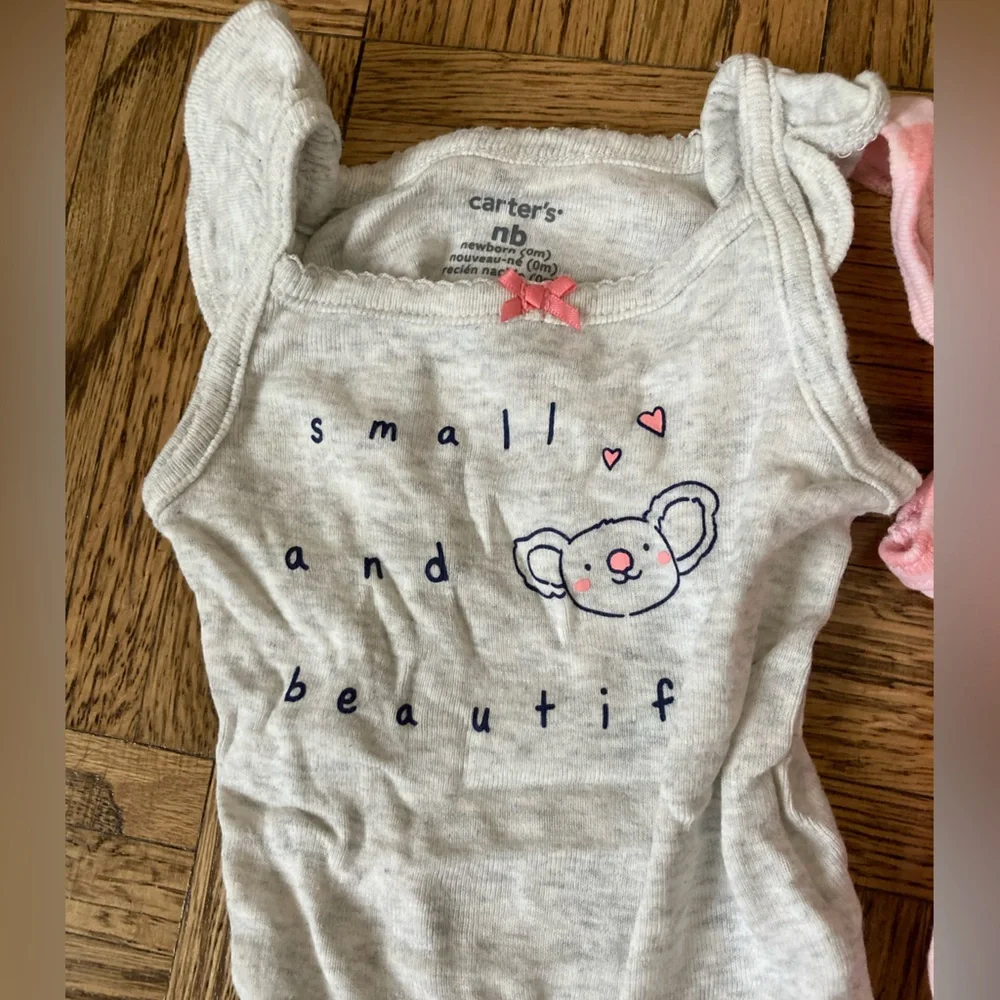 Carter’s Newborn Onesies